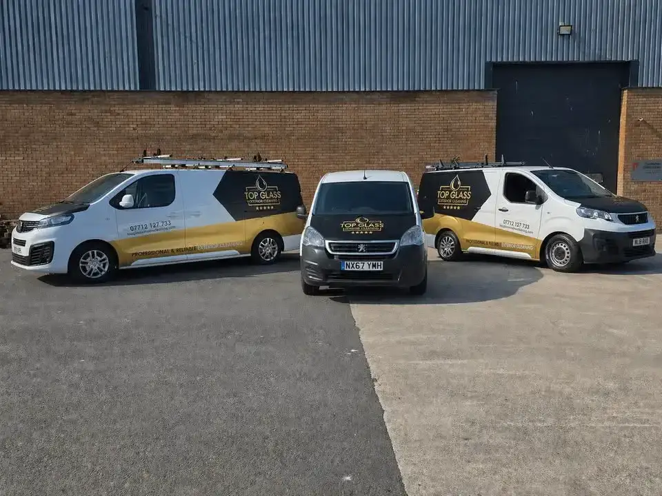 Top Glass branded professional exterior cleaning van parked outside a customer's home in North Somerset